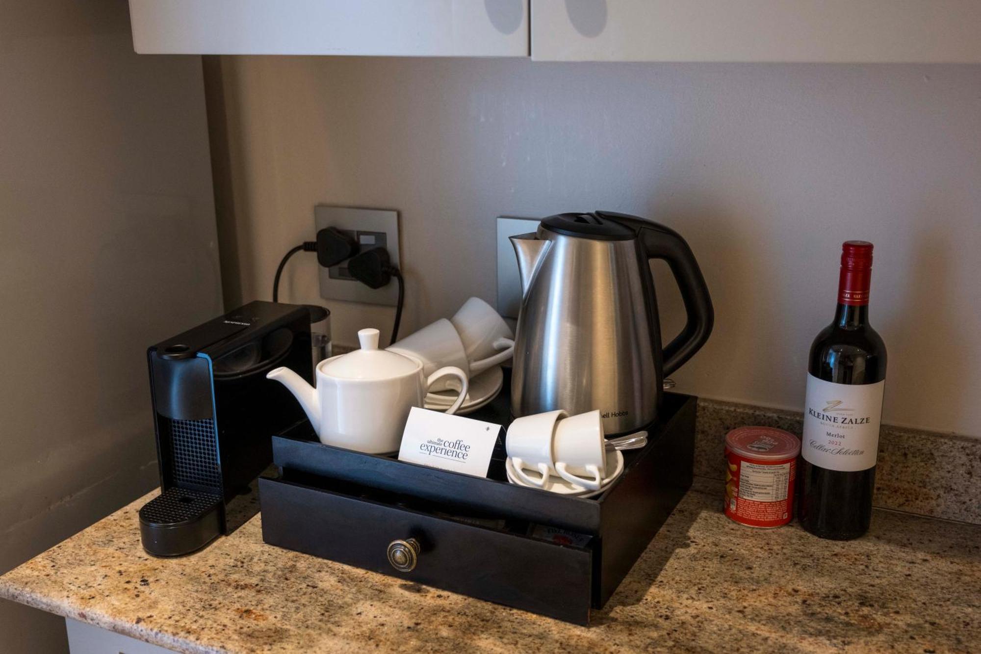 Beverly Hills Durban Bagian luar foto A Nespresso machine in a hotel room